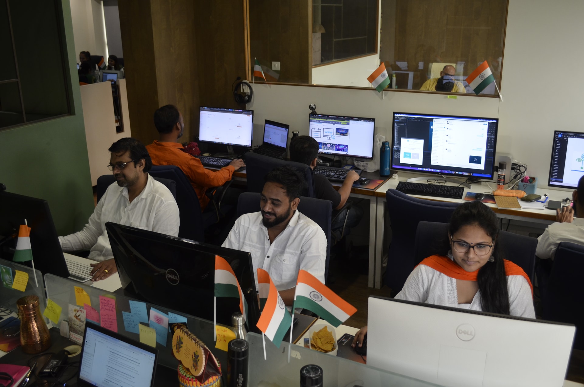 Zealousians in a festively decorated office for 15th August