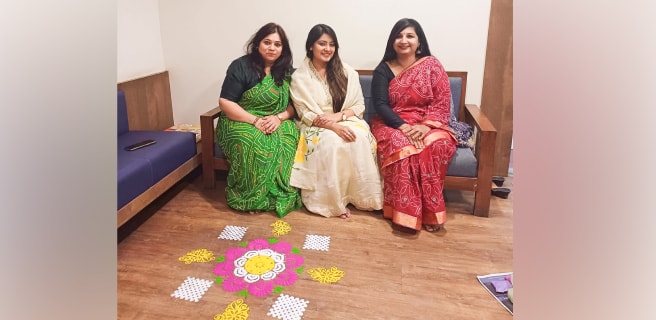 Girls with rangoli