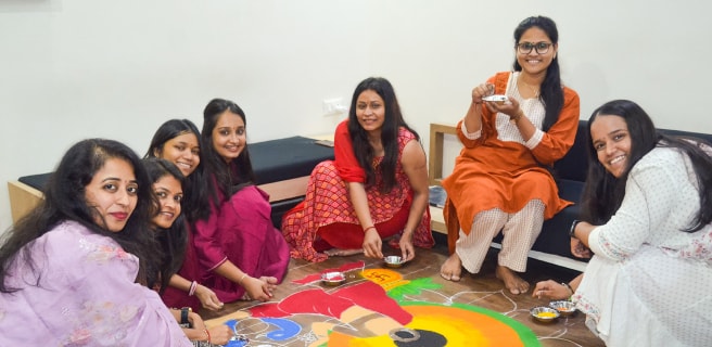 Group creating rangoli