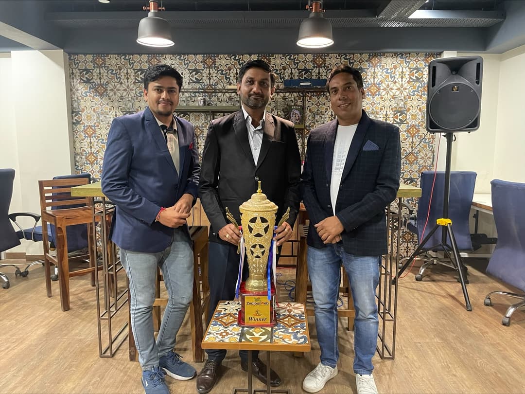 Captains Posing with the ZPL Trophy